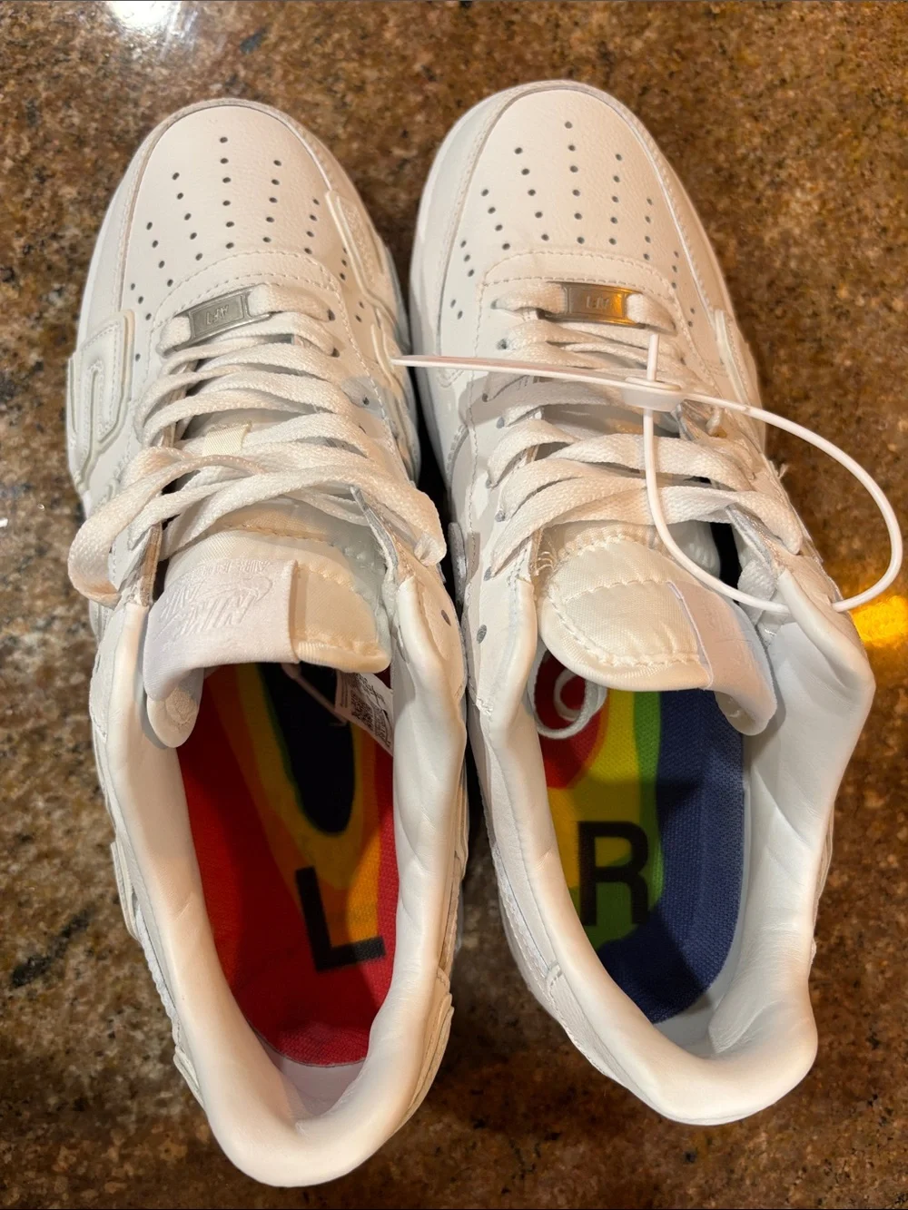 All-White Embossed Low-Top Sneakers